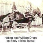 Picture of Hilbert and William Dreps on Birdy, a blind horse.